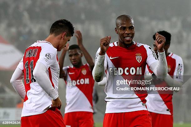 Monaco's French defender Djibril Sidibe celebrates at the end of the French L1 football match Bordeaux vs Monaco on December 10, 2013 at the Matmut...