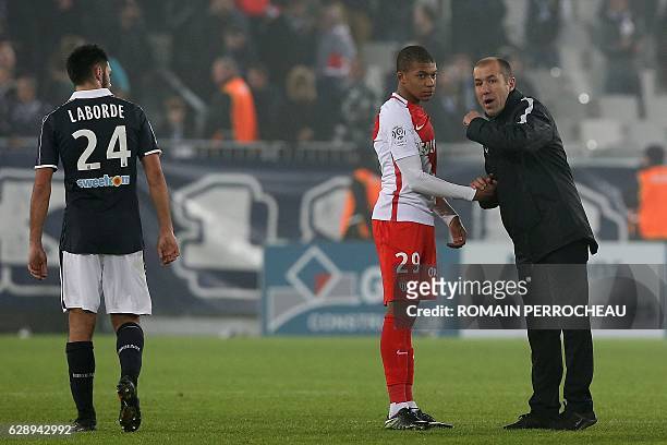 Monaco's French forward Kylian Mbappe talks with Monaco's Portuguese head coach Leonardo Jardim at the end of the French L1 football match Bordeaux...