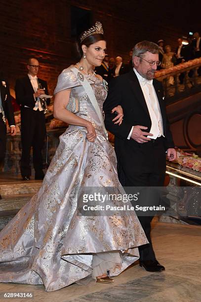 Crown Princess Victoria of Sweden and Professor J. Michael Kosterlitz, laureate of the Nobel Prize in Physics arrive at the Nobel Prize Banquet 2015...