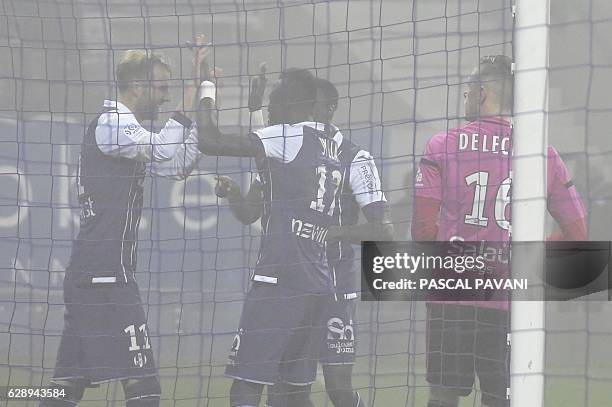 Toulouse's Swedish forward Ola Toivonen celebrates with his teammates after scoring a goal during the French L1 football match between Toulouse and...