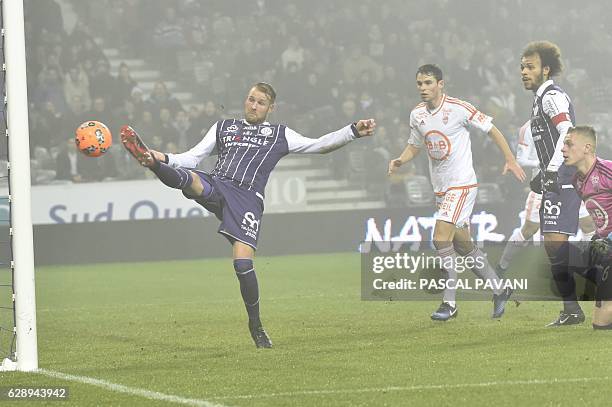 Toulouse's Swedish forward Ola Toivonen scores a goal during the French L1 football match between Toulouse and Lorient December 10, 2016 at the...