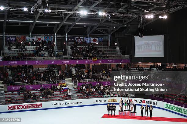 Anna Duskova and Martin Bidar of Czech Republic, Anastasia Mishina and Vladislav Mirzoev of Russia pose during Junior Pairs medal ceremony on day...