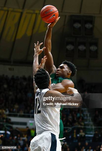 Evan Clayborne of the Cleveland State Vikings shoots the ball against Vince Edwards of the Purdue Boilermakers at Mackey Arena on December 10, 2016...