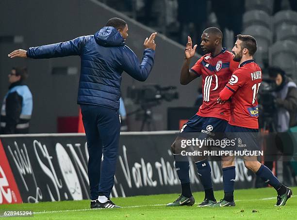 Lille's French midfielder Younousse Sankhare celebrates after scoring a goal during the French L1 football match Lille vs Montpellier on December 10,...
