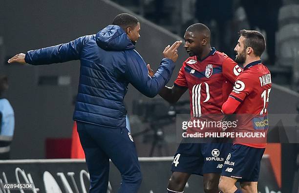 Lille's French midfielder Younousse Sankhare celebrates after scoring a goal during the French L1 football match Lille vs Montpellier on December 10,...