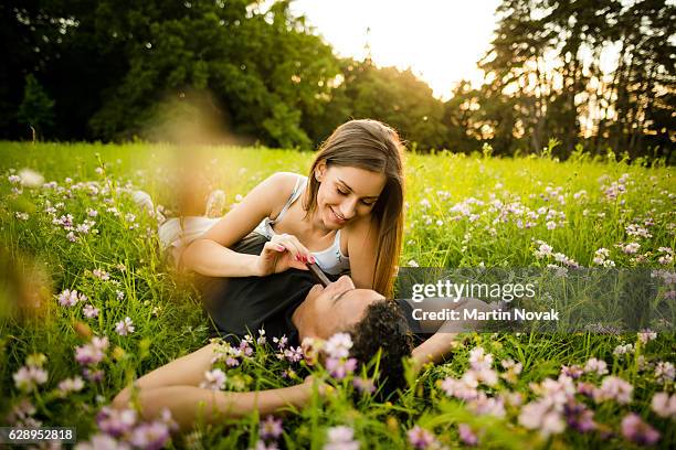 sweet moments - couple having great time - chocolate closed eyes stock-fotos und bilder