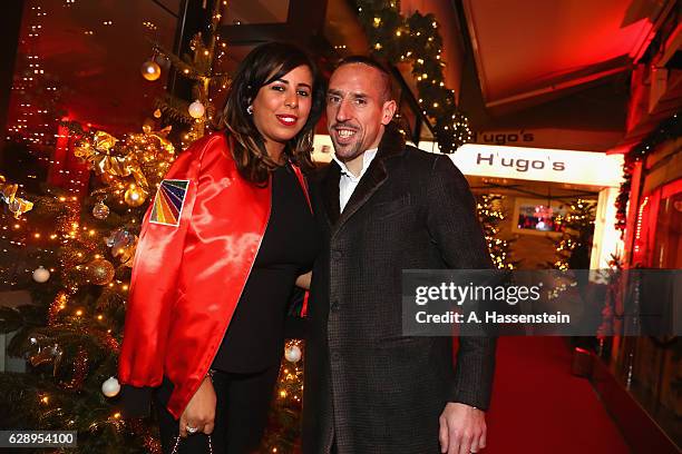 Franck Ribery of FC Bayern Muenchen and his wife Wahiba Ribery arrive for the club's Christmas party at H'ugo's bar on December 10, 2016 in Munich,...