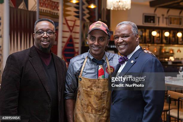 , celebrity chef Marcus Samuelsson, poses for a photo with Rushern L. Baker III, County Executive, Prince George's County, in the restaurant, Marcus,...