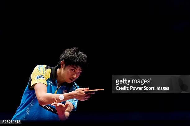 Yuto Muramatsu of Japan in action against Xu Xin of China at their Men's Singles Quarter Final match during the Seamaster Qatar 2016 ITTF World Tour...