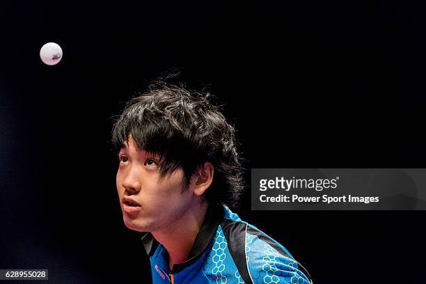 Yuto Muramatsu of Japan in action against Xu Xin of China at their Men's Singles Quarter Final match during the Seamaster Qatar 2016 ITTF World Tour...