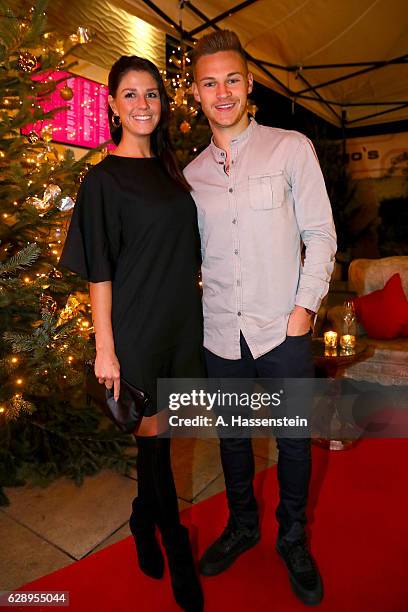 Joshua Kimmich of FC Bayern Muenchen attends with Lina Meyer the club's Christmas party at H'ugo's bar on December 10, 2016 in Munich, Germany.