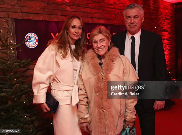 Team coach Carlo Ancelotti of FC Bayern Muenchen and his wife Mariann Barrena McClay arrive for the club's Christmas party at H'ugo's bar on December...
