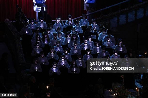 Group of girls performs during the 2016 Nobel Banquet for the laureates in medicine, chemistry, physics, literature and economics in Stockholm, on...