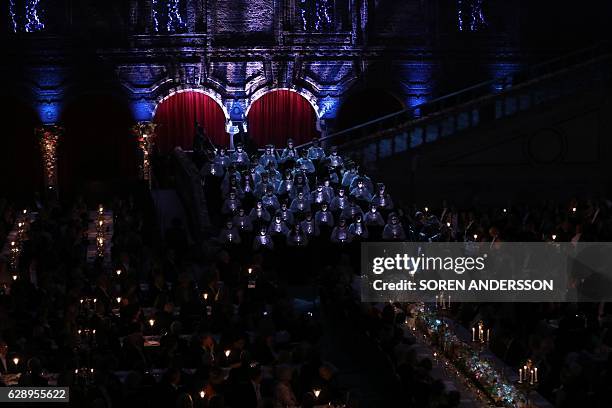 Group of girls performs during the 2016 Nobel Banquet for the laureates in medicine, chemistry, physics, literature and economics in Stockholm, on...