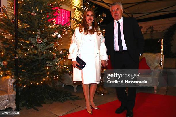 Carlo Ancelotti, head coach of FC Bayern Muenchen attends with Mariann Barrena McClay the club's Christmas party at H'ugo's bar on December 10, 2016...