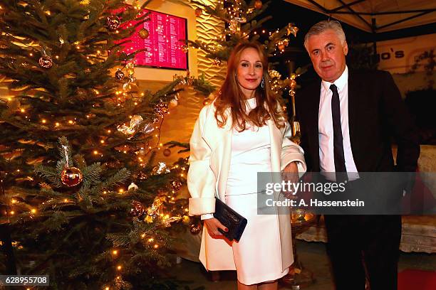 Carlo Ancelotti, head coach of FC Bayern Muenchen attends with Mariann Barrena McClay the club's Christmas party at H'ugo's bar on December 10, 2016...