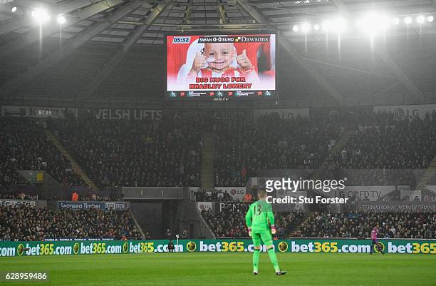 The big screen shows Bradley Lowery during the Premier League match between Swansea City and Sunderland at Liberty Stadium on December 10, 2016 in...