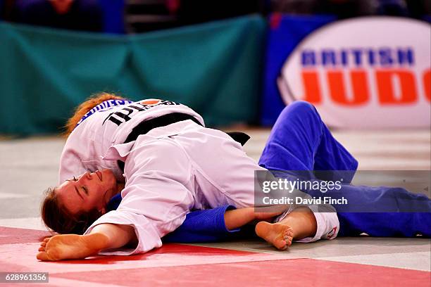 Lubjana Piovesana of Bishop Challoner JC throws and then holds Molly Game of Osaka JC to win their u63kg contest by an ippon during the 2016 British...