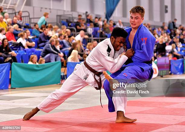Aaron Mahoney-Jones of Ernest Bevin JC thows Alan England of New Star JC but eventually lost their u81kg contest by an ippon to Alan England during...