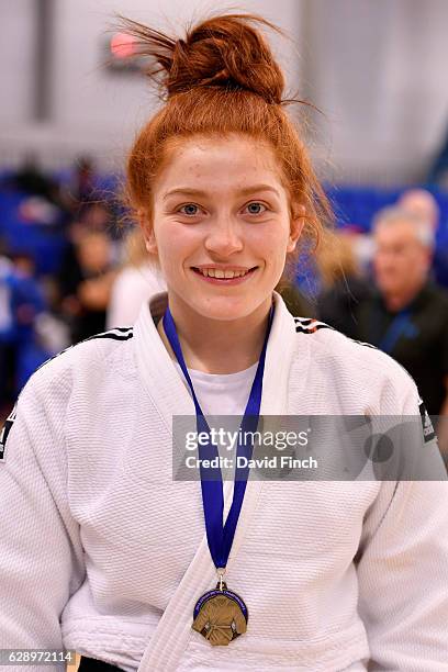 Lubjana Piovesana of Bishop Challoner JC proudly wears her u63kg gold medal after winning all of her seven contests by ippon during the 2016 British...