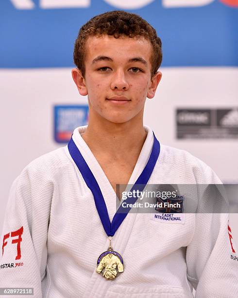 Joshua Giles of the Coventry Judo Club poses with his u55kg gold medal during the 2016 British Junior Judo Championships at the English Institute of...