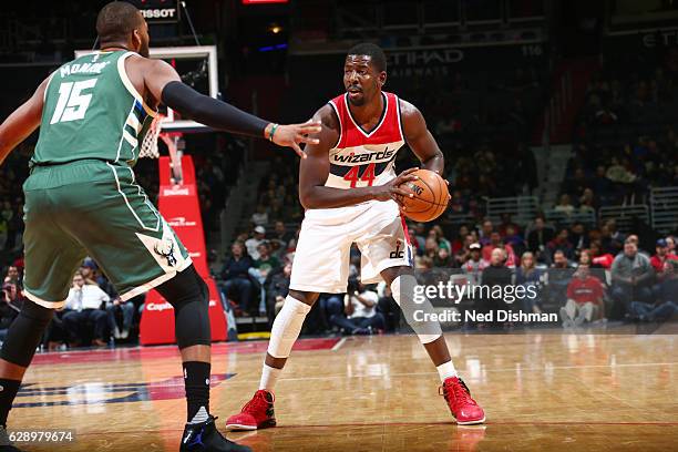 Andrew Nicholson of the Washington Wizards handles the ball against the Milwaukee Bucks during the game on December 10, 2016 at Verizon Center in...