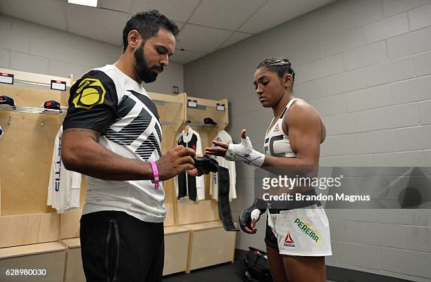 Viviane Pereira of Brazil puts her gloves on backstage during the UFC 206 event inside the Air Canada Centre on December 10, 2016 in Toronto,...