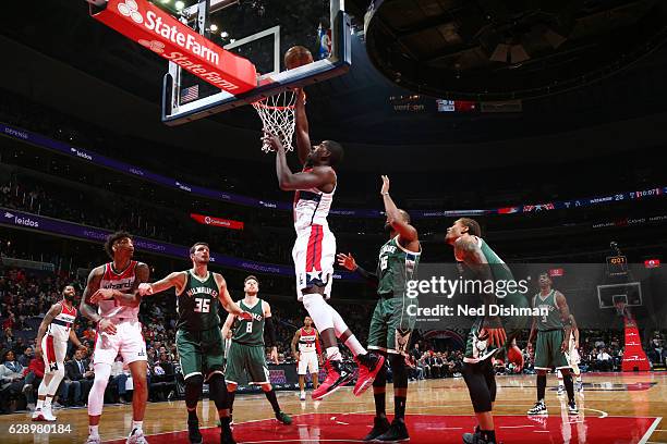 Andrew Nicholson of the Washington Wizards dunks against the Milwaukee Bucks during the game on December 10, 2016 at Verizon Center in Washington,...