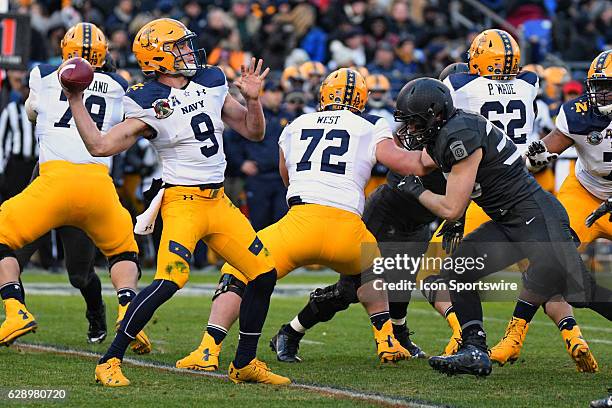 Navy Midshipmen quarterback Zach Abey passes the ball against the Army Black Knights on December 10, 2016 at M&T Bank Stadium in Baltimore, MD. In...