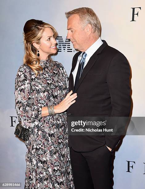 Christine Baumgartner and Kevin Costner attend the "Hidden Figures" New York Special Screening on December 10, 2016 in New York City.