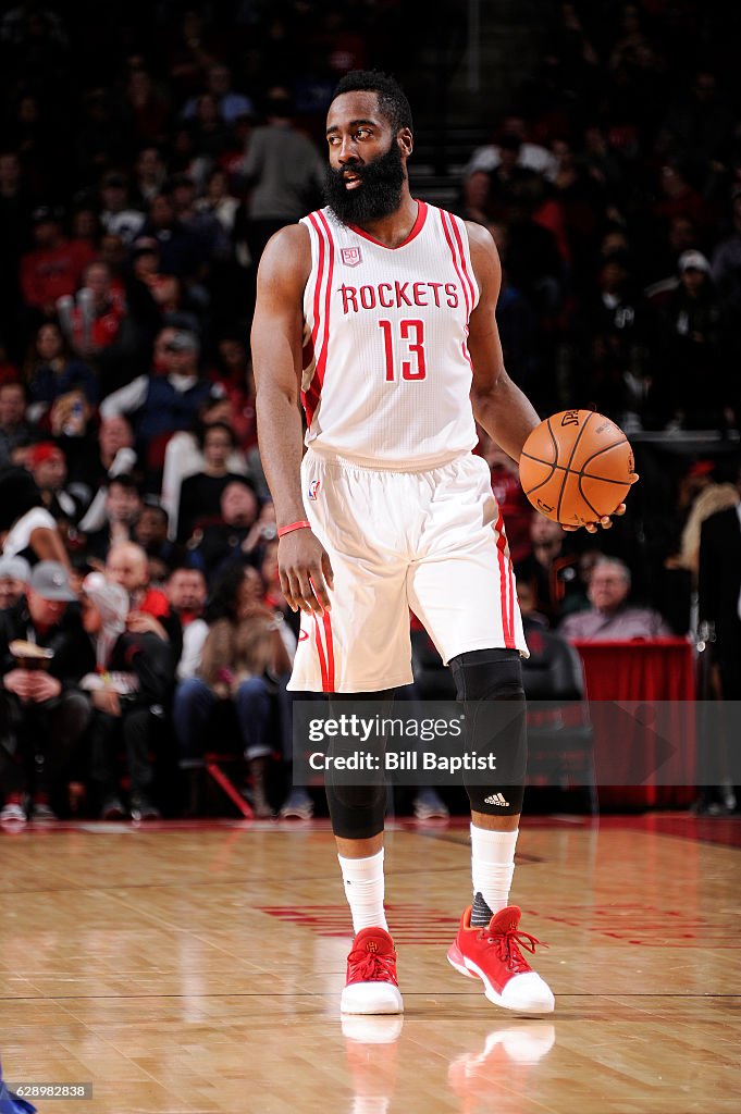 Harden Rockets James Harden of the Houston Rockets handles the ball during a game ...