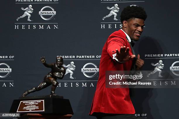 Lamar Jackson of the Louisville Cardinals poses for a photo after being named the 82nd Heisman Memorial Trophy Award winner during the 2016 Heisman...