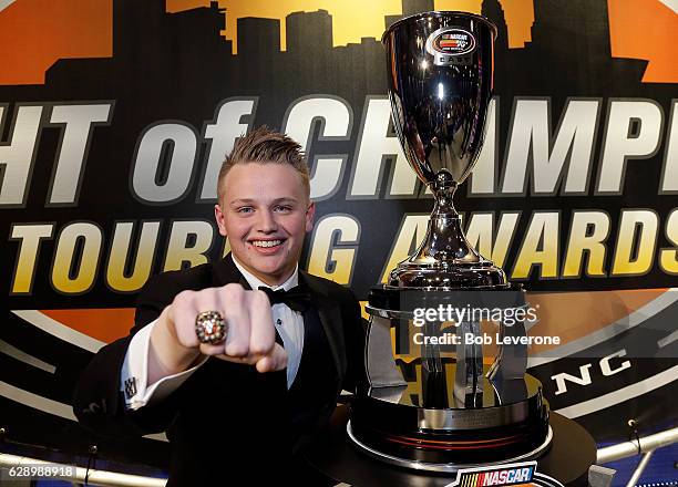 Pro Series East Champion Justin Haley with his ring and trophy during the NASCAR Touring Series Night of Champions in the Charlotte Convention Center...