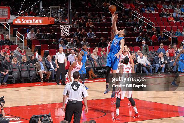 Salah Mejri of the Dallas Mavericks goes up for a rebound during a game against the Houston Rockets on December 10, 2016 at the Toyota Center in...