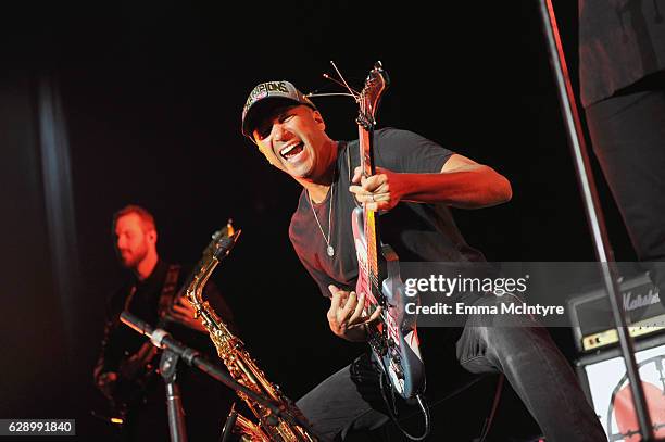 Guitarist Tom Morello performs onstage with the band X Ambassadors at 106.7 KROQ Almost Acoustic Christmas 2016 - Night 1 at The Forum on December...