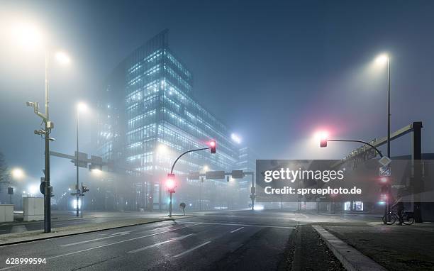 berlin potsdamer platz at foggy night - berlin mitte stock-fotos und bilder