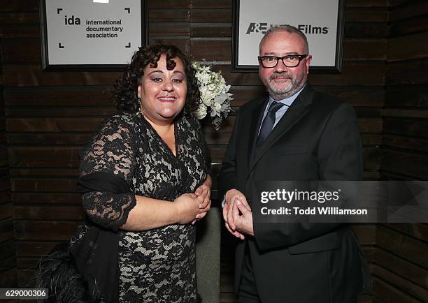 Board President Marjan Safinia and IDA Executive Director Simon Kilmurry attend the 32nd Annual IDA Documentary Awards at Paramount Studios on...