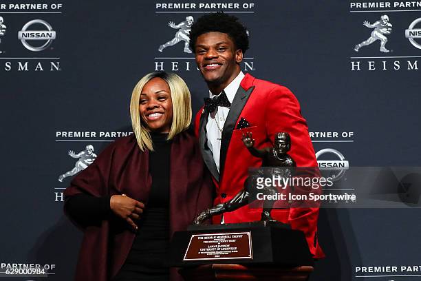 Heisman Trophy winner University of Louisville quarterback Lamar Jackson with his mother Felicia Jonesafter winning the 81st Annual Heisman Trophy...