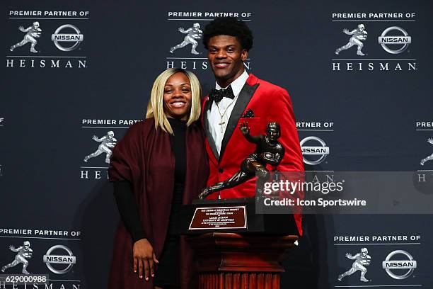 Heisman Trophy winner University of Louisville quarterback Lamar Jackson with his mother Felicia Jonesafter winning the 81st Annual Heisman Trophy...