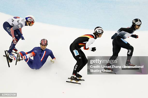 Paul Beauchamp of France fall after crash with Kei Saito of Japan, Da Woon Sin of Korea and Felix Spiegl of Germany competes in the men's 500m...