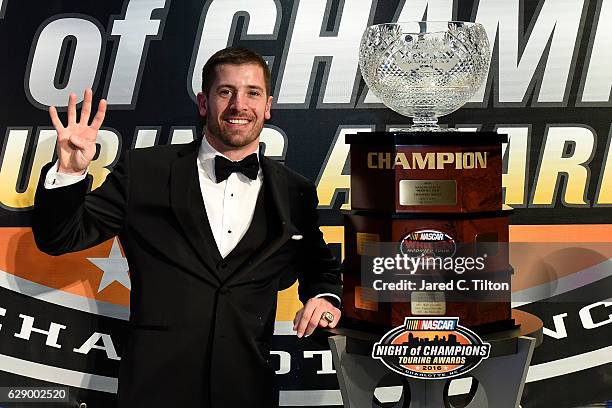 Whelen Modified Tour Champion Doug Coby poses for a portrait after the NASCAR Touring Series Night of Champions in the Charlotte Convention Center at...