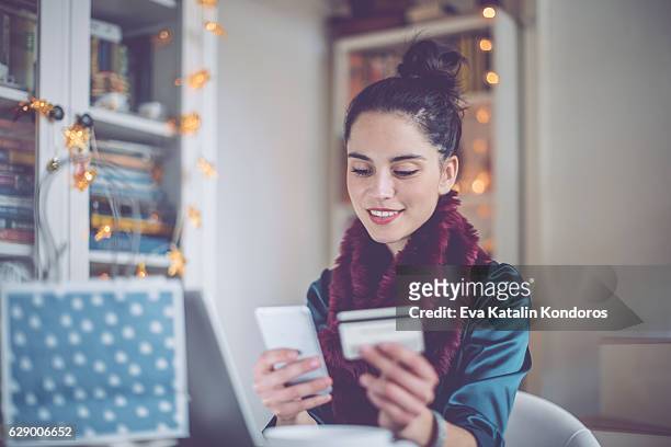 young woman at home - shopping online blue stock pictures, royalty-free photos & images