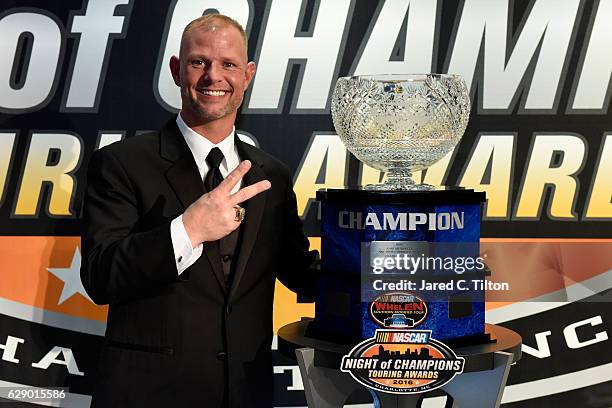 Whelen Southern Modified Tour Champion Burt Meyers poses for a portrait after the NASCAR Touring Series Night of Champions in the Charlotte...