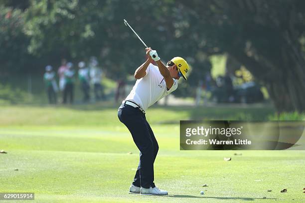 Rafa Cabrera Bello of Spain plays his second shot into the first green during the final round of the UBS Hong Kong Open at The Hong Kong Golf Club on...