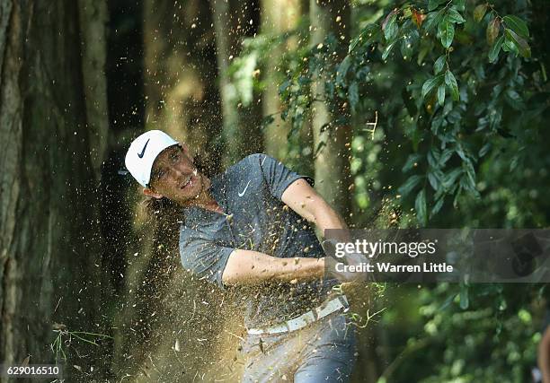 Tommy Fleetwood of England plays his third shot on the third hole during the final round of the UBS Hong Kong Open at The Hong Kong Golf Club on...