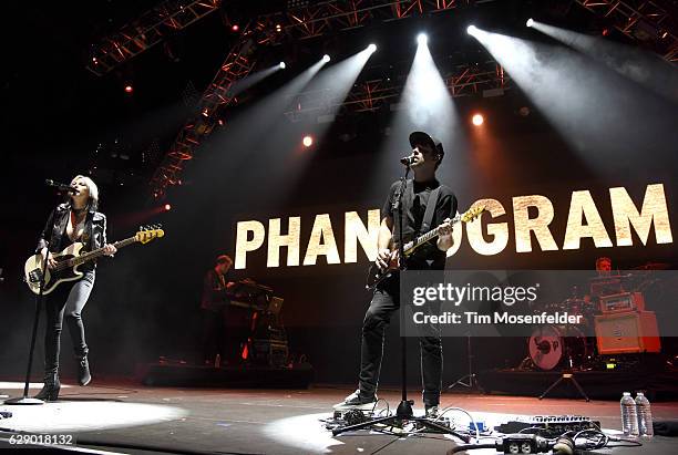 Sarah Barthel and Josh Carter of Phantogram perform during Live 105's Not So Silent Night at ORACLE Arena on December 10, 2016 in Oakland, California.