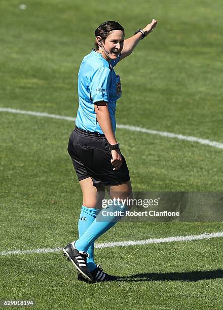 Referee Kate Jacewicz gestures during the round six W-League match between Melbourne Victory and Western Sydney Wanderers at Lakeside Stadium on...