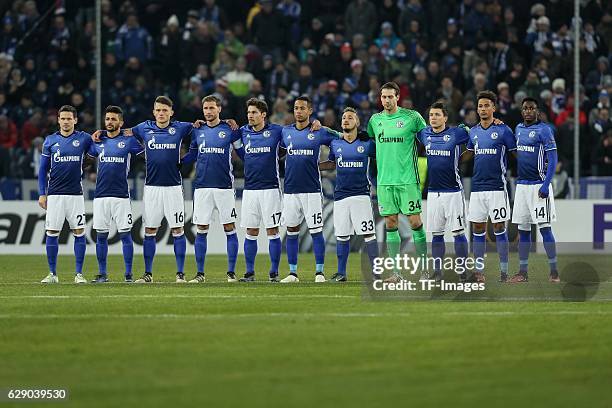 Football players lineup for a minute of silence in memory of the members of the Brazillian soccer team Chapecoense who died in a plane crash before...