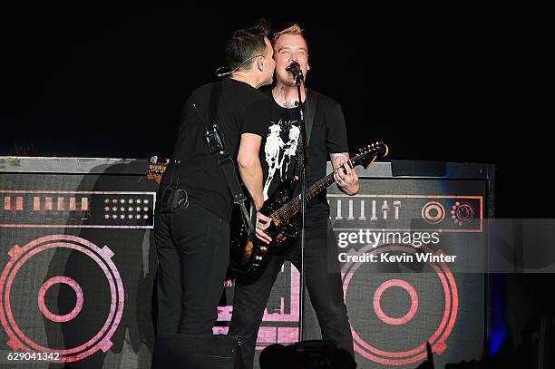 Mark Hoppus and Matt Skiba of the band Blink-182 perform onstage at 106.7 KROQ Almost Acoustic Christmas 2016 - Night 1 at The Forum on December 10,...