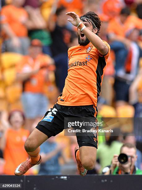 Thomas Broich of the Roar celebrates scoring a goal during the round 10 A-League match between the Brisbane Roar and Adelaide United at Suncorp...